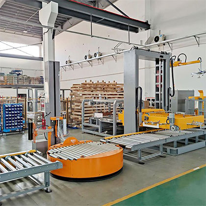 Gantry type low-level palletizer